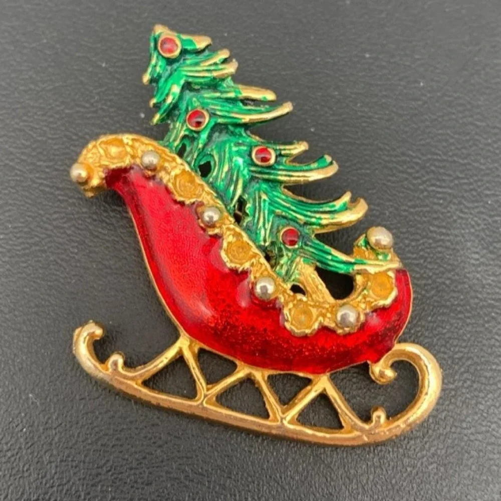 Vintage Christmas tree in a sleigh brooch